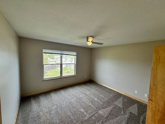 Building Photo - Two Story Townhome Available July 2025!