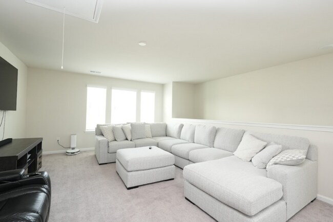 Primary Photo - Spacious 4-Bedroom Home with Modern Comforts
