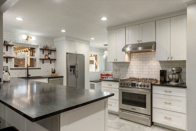 Building Photo - Gorgeous Mid-Century Home Newly Renovated From Top To Bottom - Inside And Outside - With Newer Wi...