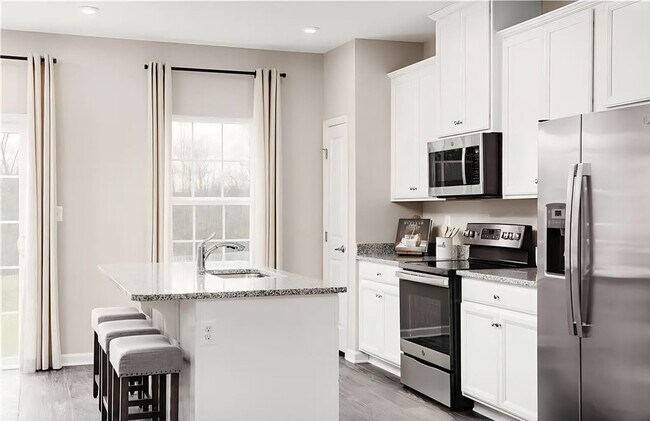 Building Photo - Tri Level Townhouse Ready for A New Tenant
