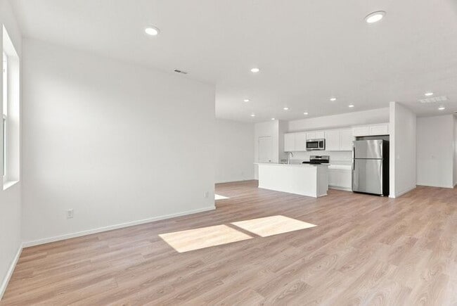 Building Photo - Modern 4-Bedroom Home with a 3-Car Garage & Covered Patio