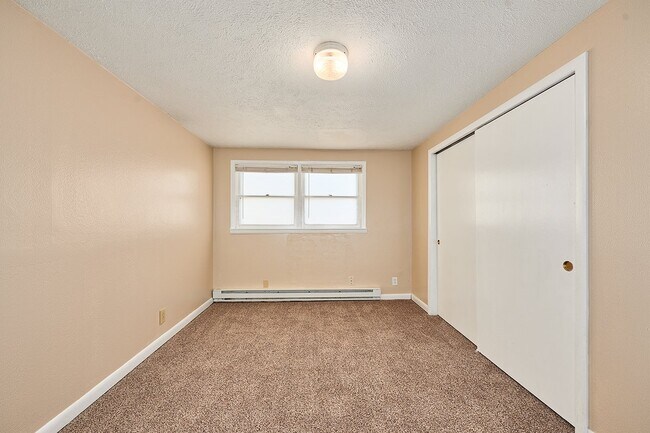 Building Photo - Coming Soon: 2 BR unit that includes water, trash, and yard care.