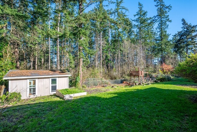 Building Photo - Spacious 4-Bedroom Home with Fireplace, Fenced Yard, and 2-Car Garage