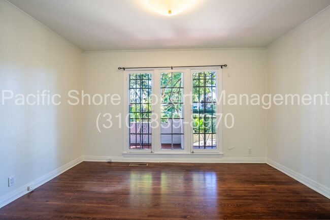 Building Photo - 8159 Willoughby Ave