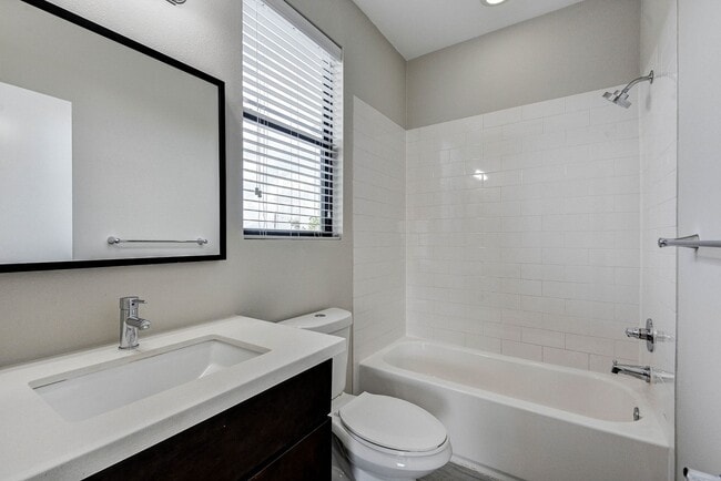 Building Photo - Modern Comfort Meets City Living — 3-Story Townhome Ready Now!