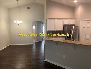 Building Photo - Spacious 4-Bedroom Home with Office in Portofino!  LOOK!