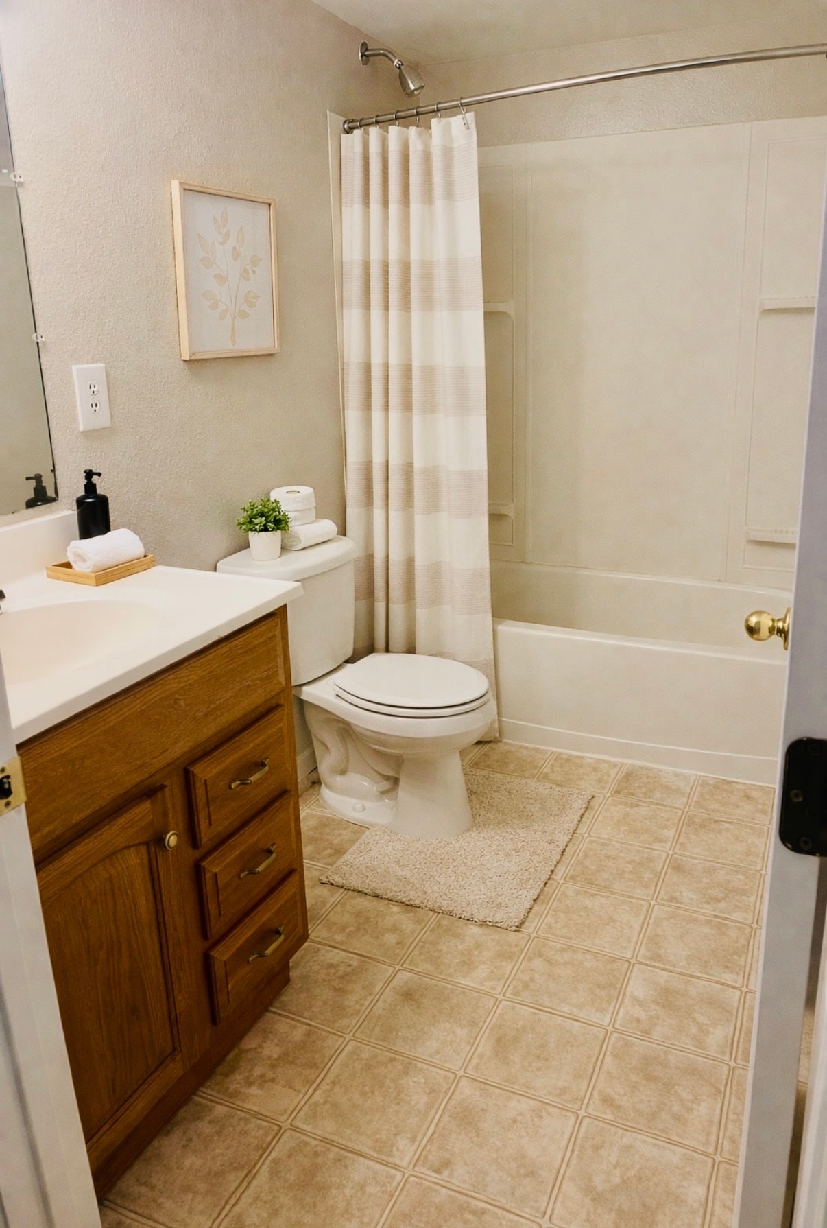 Basement full bathroom, virtually staged with decor only. New LPV flooring will be installed - 2563 Malpaso Pt