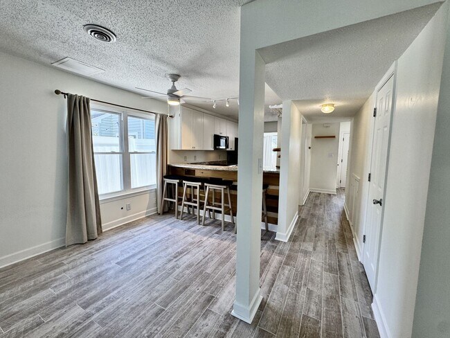 Building Photo - Ready NOW! A Custom Townhouse-Style Duplex Blocks to the Beaches! Fenced Yard - Hot Tub - Pet Fri...