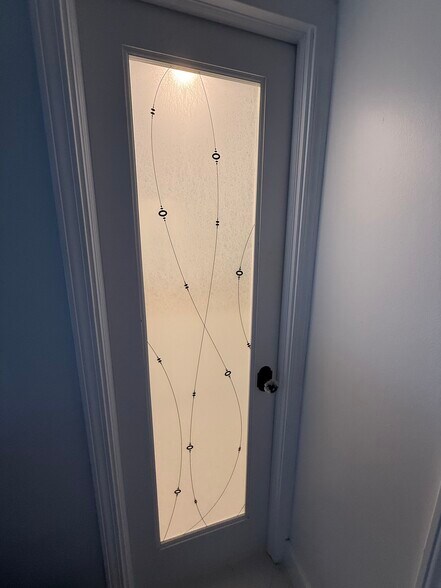 MASTER BA w glass privacy door - 780 NE 69th St