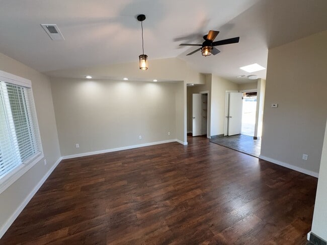 Building Photo - Newley updated 3-bedroom home features fenced yard, garage, and covered patios!