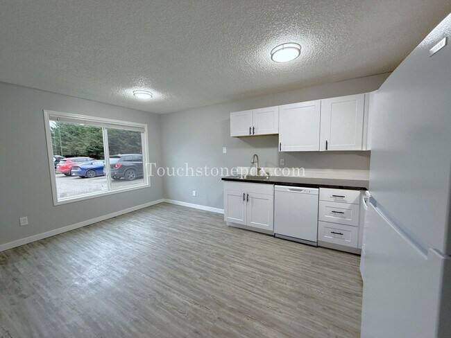 Building Photo - $500 OFF OF SECOND MONTH OF RENT! Updated Spacious 2-bedroom Apartment