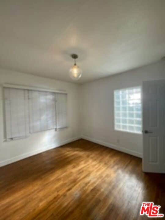 Building Photo - 3869 Hollypark Pl