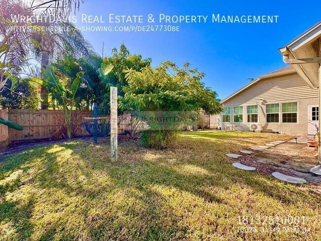 Building Photo - 10028 Oasis Palm Dr