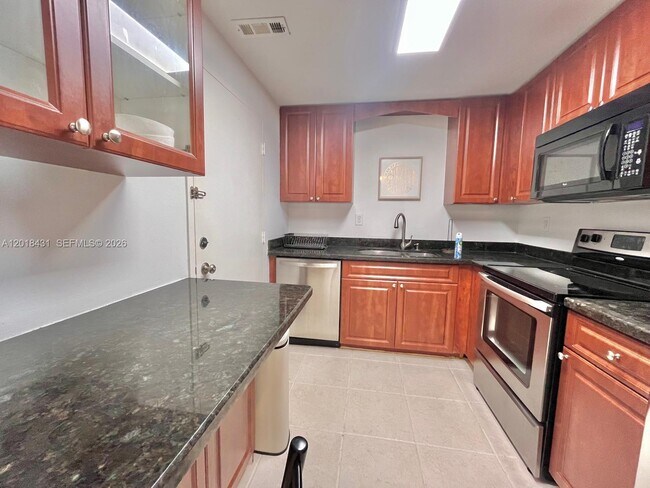 Building Photo - 5838 Collins Ave