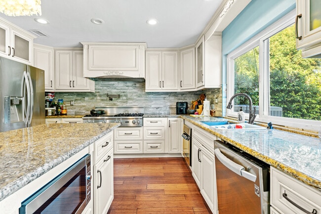 Building Photo - Spacious 4BR Family Retreat w Private Pool