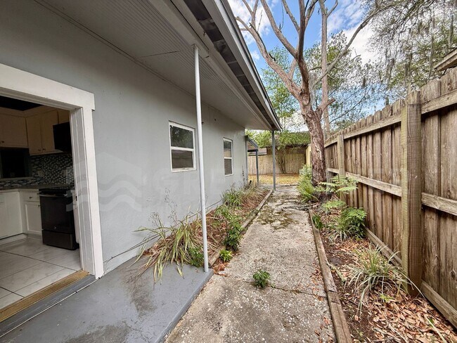 Building Photo - Fully Renovated 2BR Brick Home with Vaulted Ceilings & Backyard Retreat!