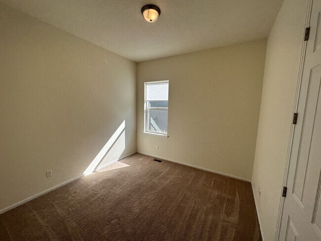 Building Photo - Modern 4-Bed Ranch in Erie with 13-Ft Ceil...