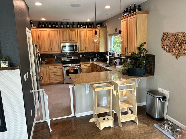 Building Photo - Incredible 4-bedroom Family Home with Fine Finishes and Private Spaces