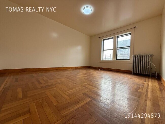 Building Photo - 710 E 235th St