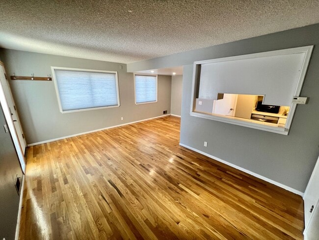 Building Photo - TWO STORY TOWNHOME, NEW FLOORING/CARPET, TWO TONE PAINT, STAINLESS APPLIANCES, WASHER/DRYER, CORN...