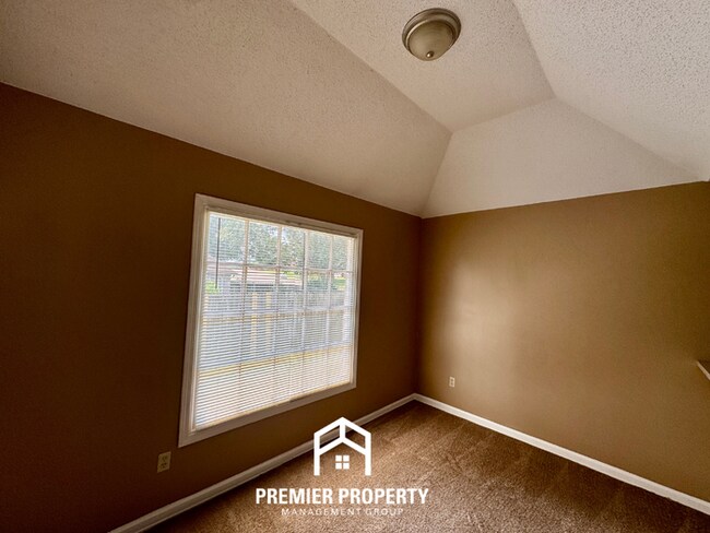 Building Photo - Spacious 3BR/2BA Near Southwind | 1,958 Sq Ft, Brick Fireplace, 2-Car Garage & Quiet Cove