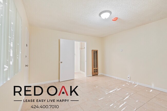 Building Photo - Spacious Two Bedroom with Tile Floors, Lar...