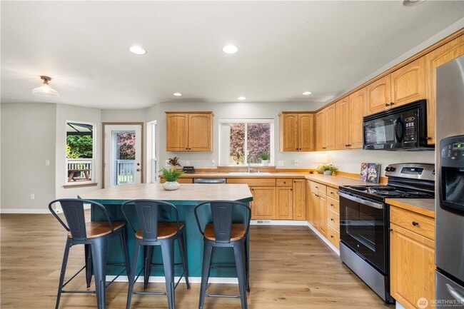 Building Photo - Enjoy this 3 bedroom, 2.5 bath home in the gated community of Stonerise