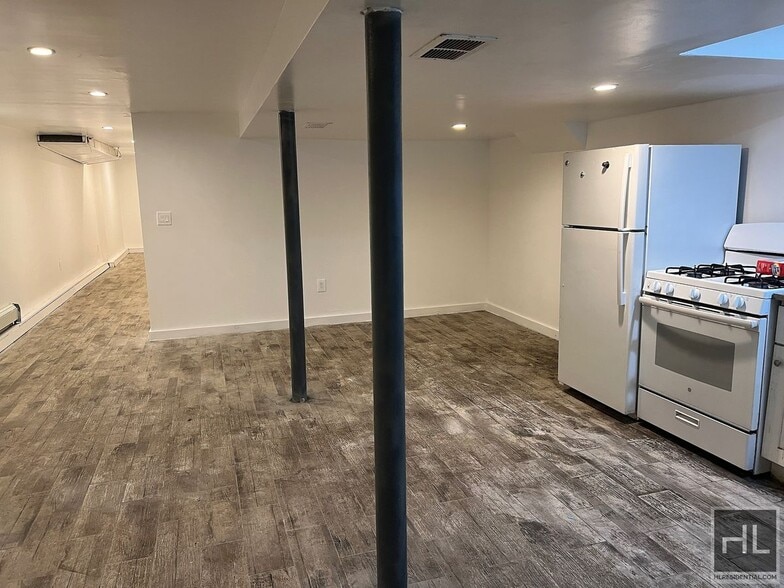 Building Photo - 2BR 1BA Lower Level All Utilities Included w/ Laundry Beside Highland Park