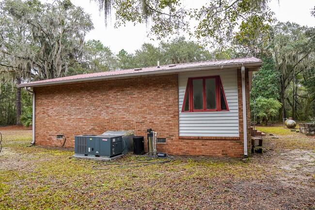 Building Photo - Tucked Away Three Bedroom Home