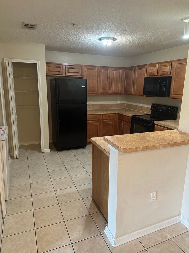 Building Photo - 9595 Amarante Cir