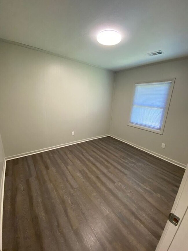 Building Photo - Quiet Living and close to the Back Gate