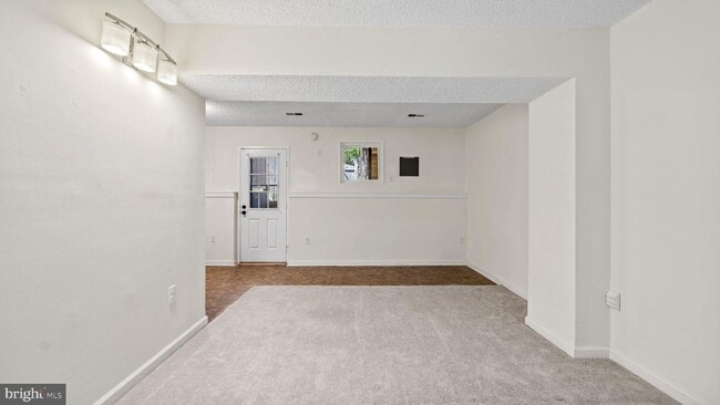 Building Photo - This stunning 3-bedroom, 2-bathroom interior townhome is sure to impress.