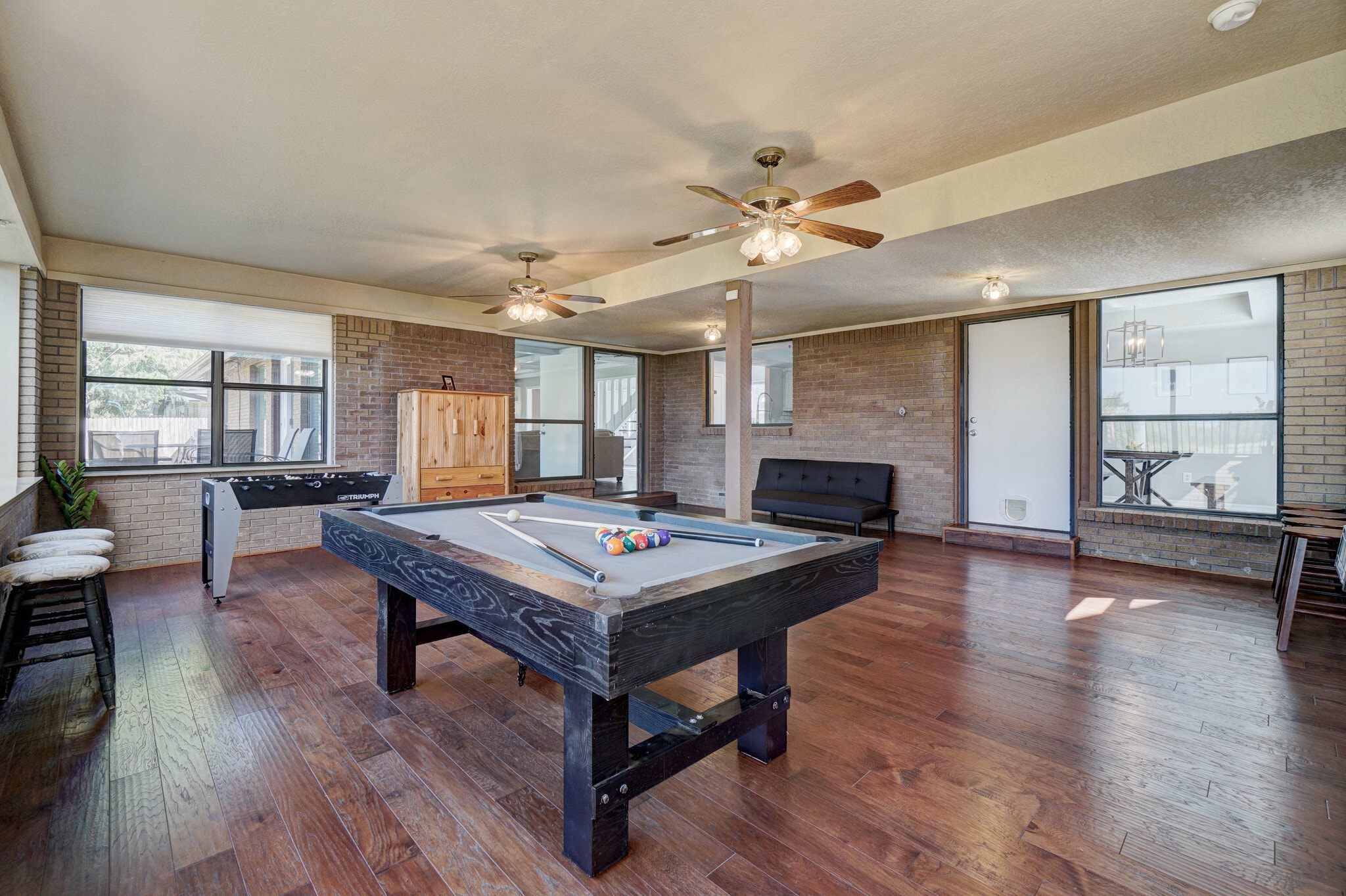 Challenge a friend to a game of pool and foosball in the Game Room. (equipped with 40" Smart TV, mag - 3905 NW 70th St