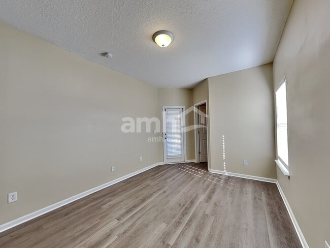 Building Photo - 7117 Rapid River Dr W