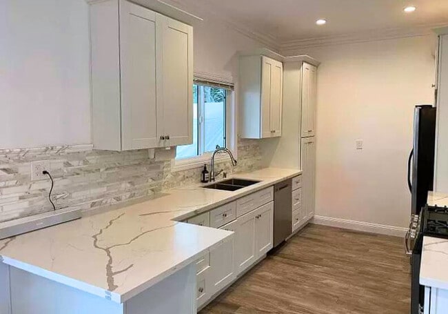 Building Photo - 5707 Melvin Ave