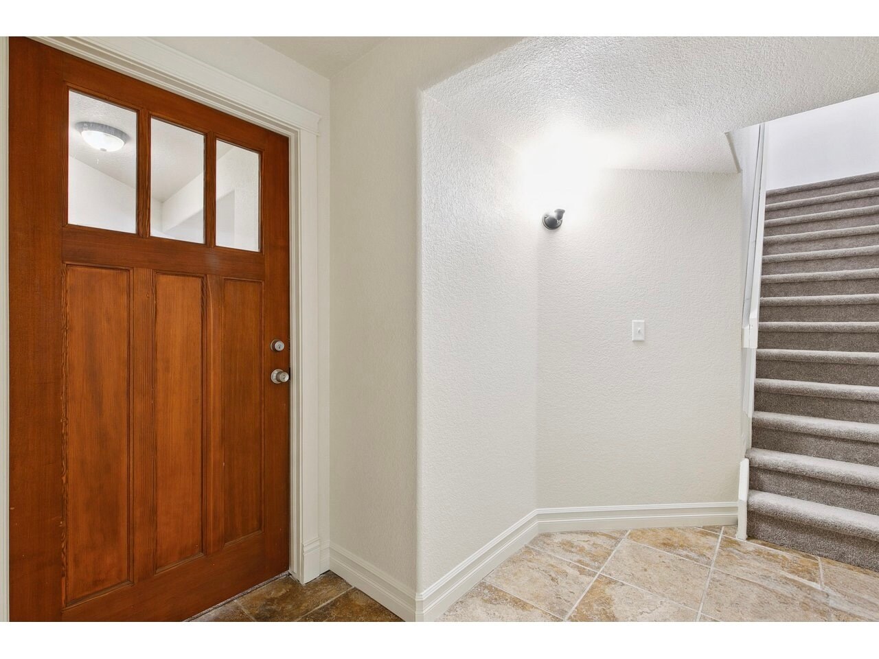 stairs down to unit with private door/mudroom - 1005 Laporte Ave