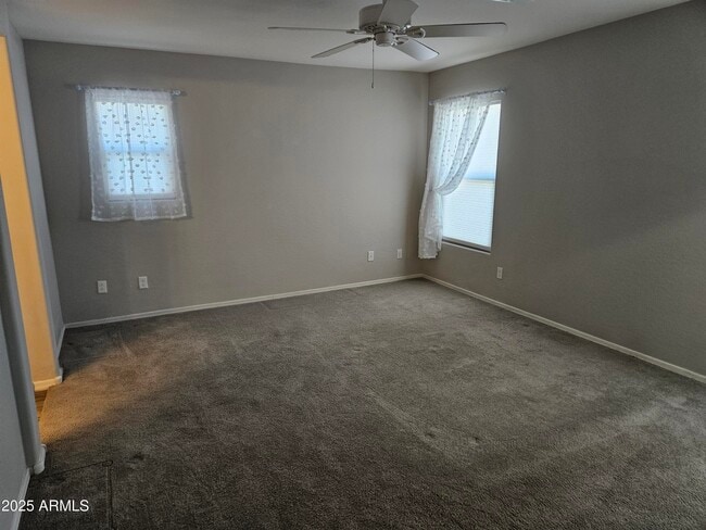 Building Photo - 40872 W Portis Dr