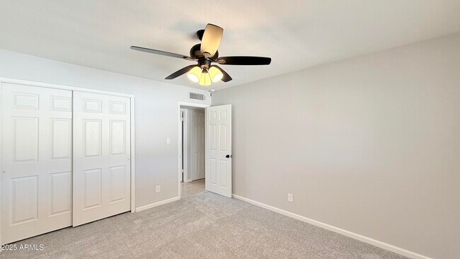 Building Photo - 8608 E Vernon Ave