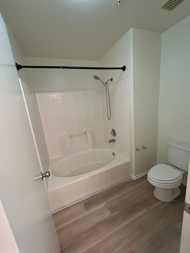Building Photo - Cute, Clean and Cozy 3 Bedroom Condo w/Att...