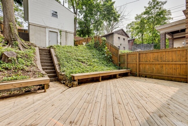 Building Photo - AVAILABLE June 2026 - Beautiful 4 Bedroom, 2 Bath Home w/ Front Porch Swing!