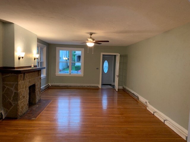 living room with wood fire place - 804 Gaskill Ave