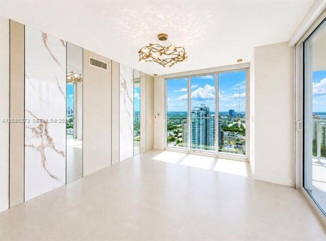 Building Photo - 16699 Collins Ave