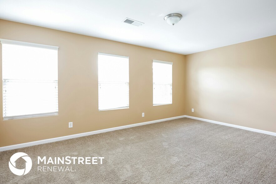 Building Photo - 6826 Championship Dr