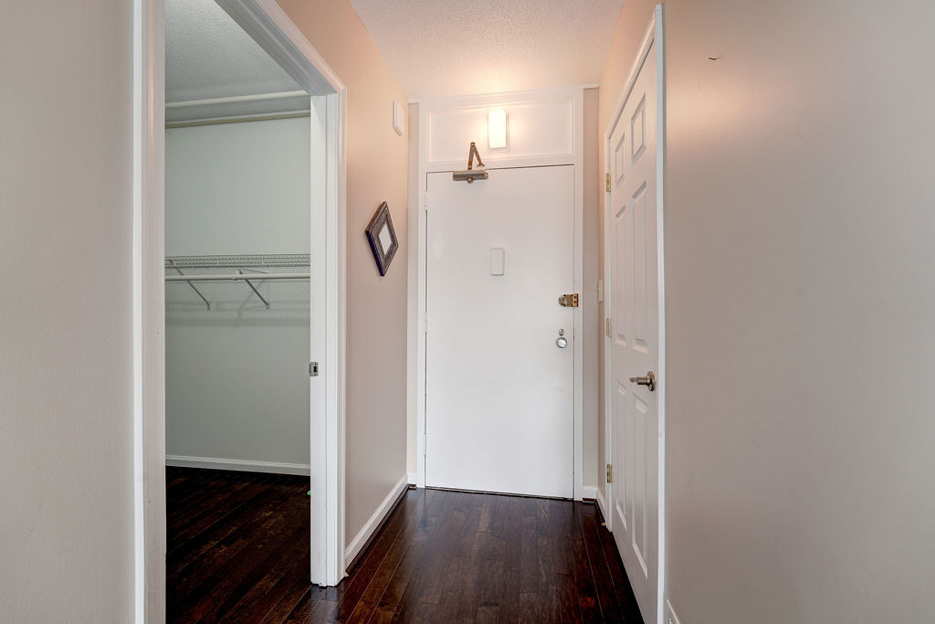 Spacious closets on either side of front door to the unit! - 4242 East West Hwy