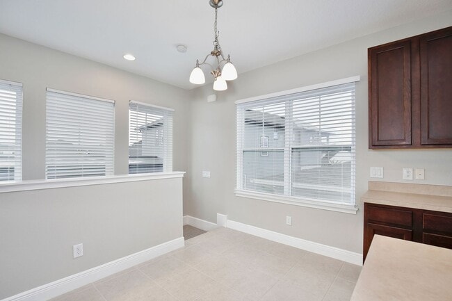 Building Photo - *Unfurnished* Beautiful 1/1 Spacious Garage Apartment in the Exclusive Laureate Park - Orlando!