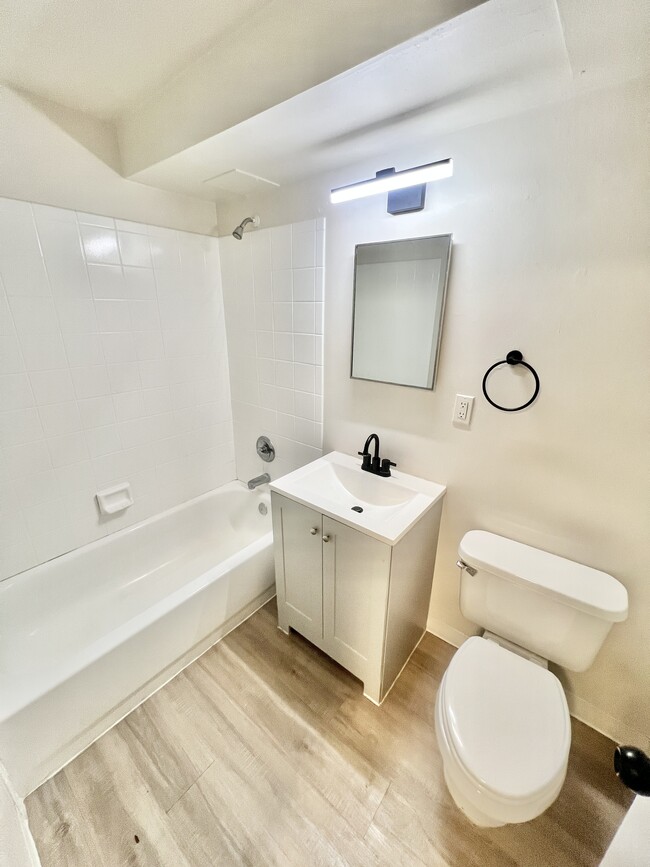 Experience sophistication in this stylish and functional bathroom space. - Rhapsody Apartments