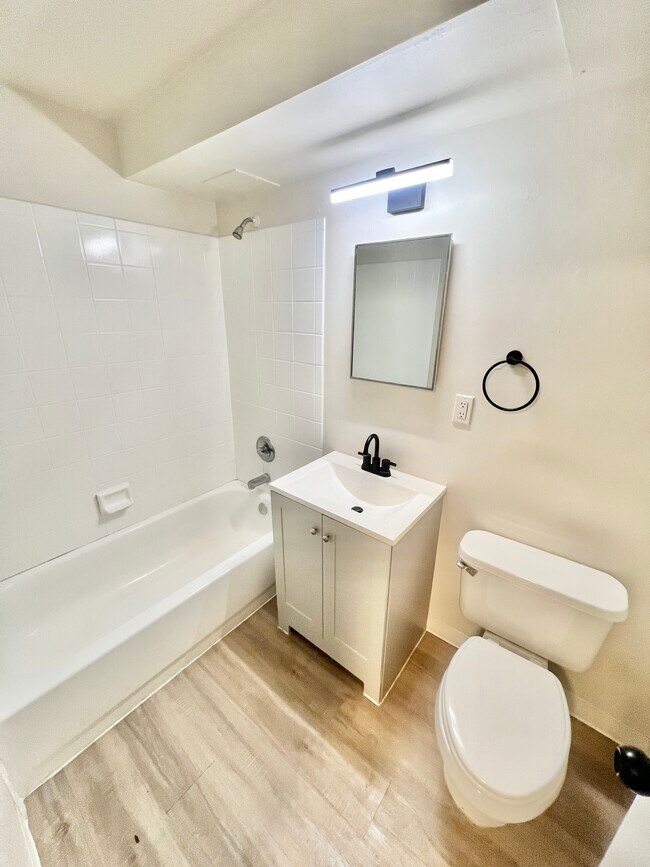 Experience sophistication in this stylish and functional bathroom space. - The Sloan