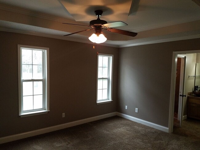 Building Photo - Spacious 3BR Brick Home with Open Split Floor Plan & Tiled Back Porch on Nearly an Acre