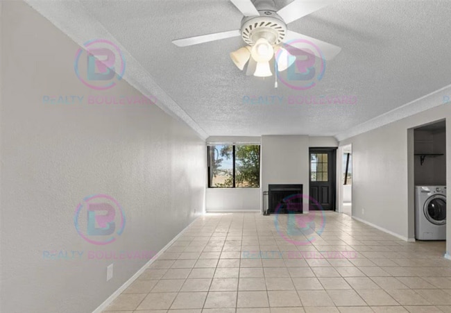 Building Photo - Incredible condo near UNR! This charming 2...