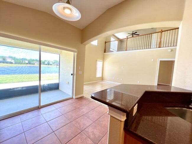 Building Photo - EAGLE CREEK LAKE NONA! WELCOME HOME! Beautiful water views! Spacious 2 story-3 bedroom 2.5 bath h...